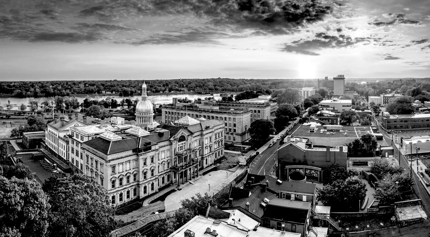 Photo of Trenton New Jersey skyline amd state capitol at sunset in black and white